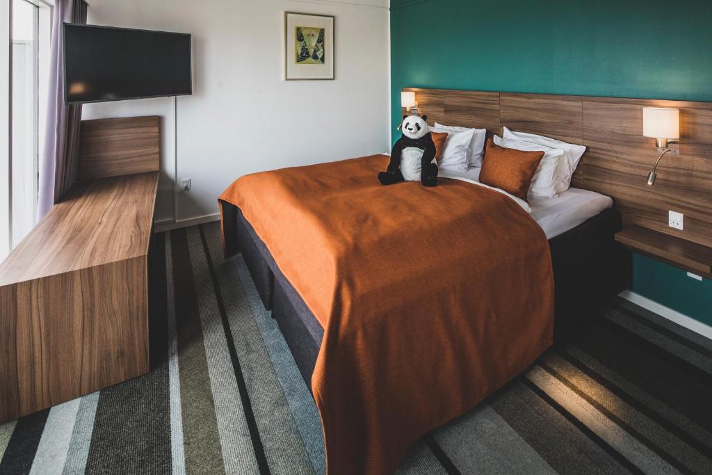 Postel nebo postele na pokoji v ubytování Hotel Atlantic