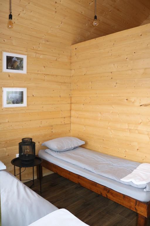 Postel nebo postele na pokoji v ubytování Cabanute Premium de pescuit