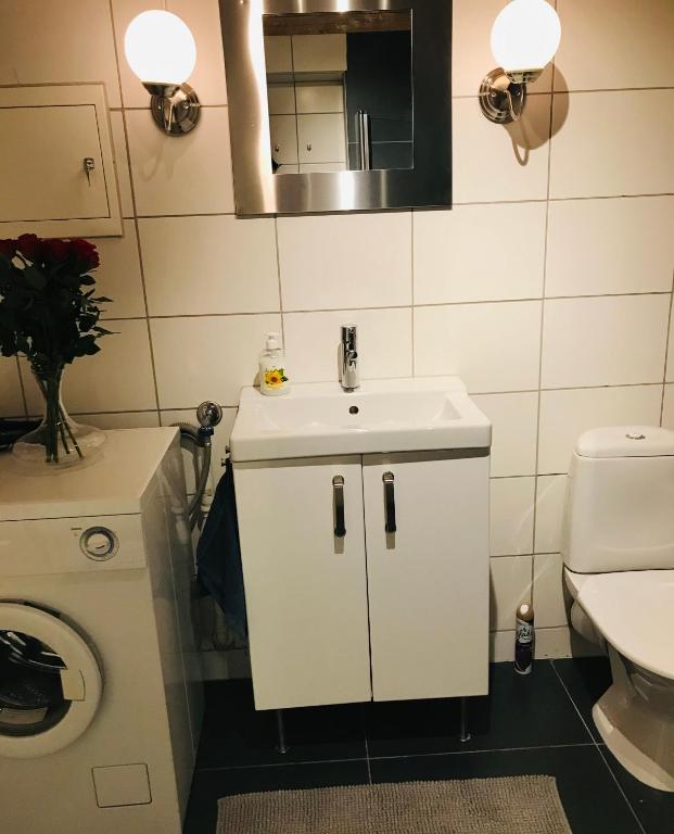 Koupelna v ubytování Taras Rom og leiligheter