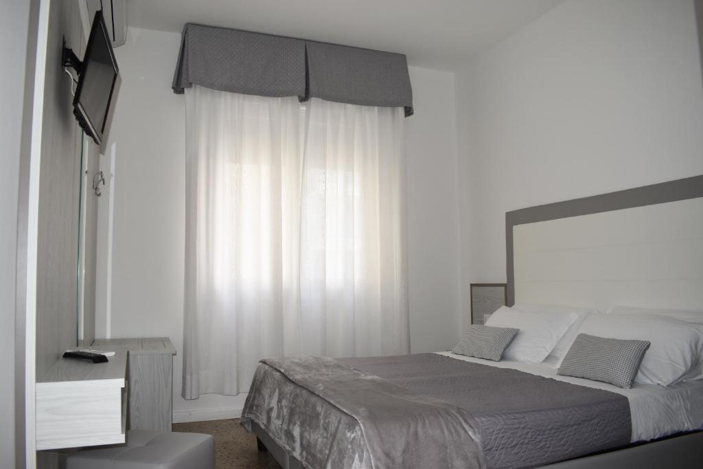 Postel nebo postele na pokoji v ubytování Hotel Edelweiss