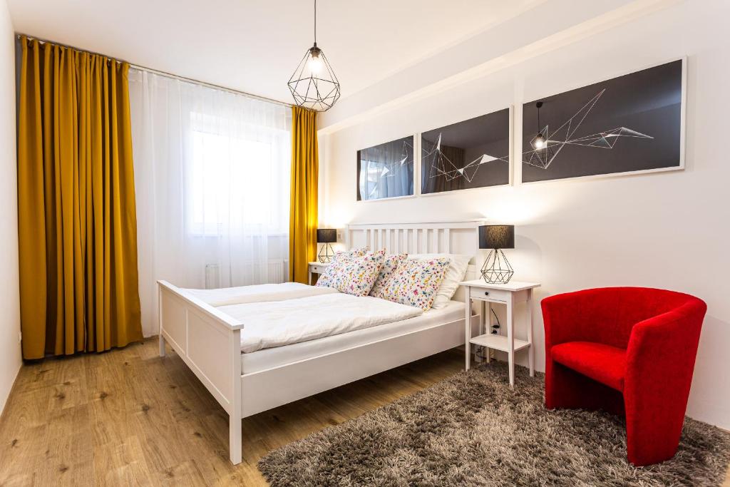 Postel nebo postele na pokoji v ubytování Aparthotel Klínovec Views