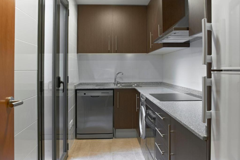 Kuchyňa alebo kuchynka v ubytovaní Barcelona Apartment Gran de Gràcia