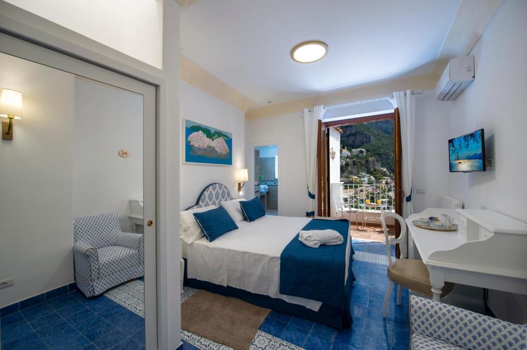 Postel nebo postele na pokoji v ubytování Hotel Casa Albertina