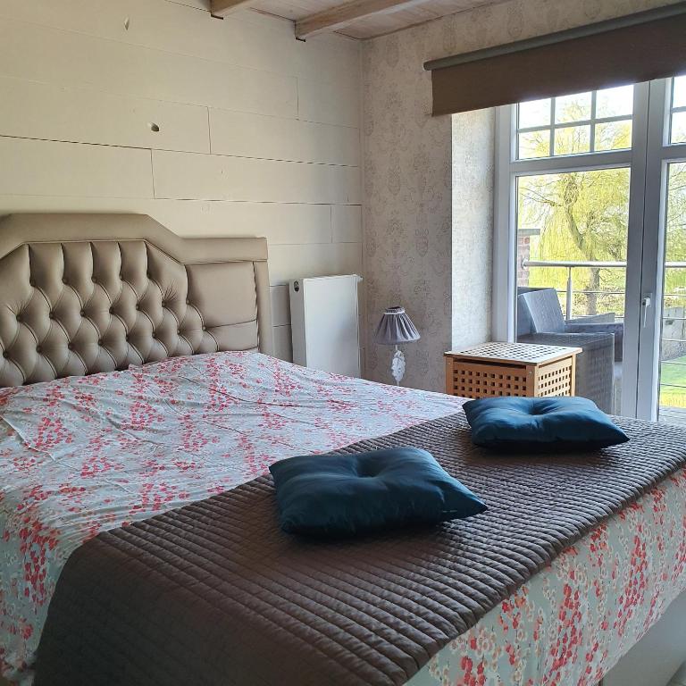 Postel nebo postele na pokoji v ubytování Luppolo vakantiehuis Westhoek