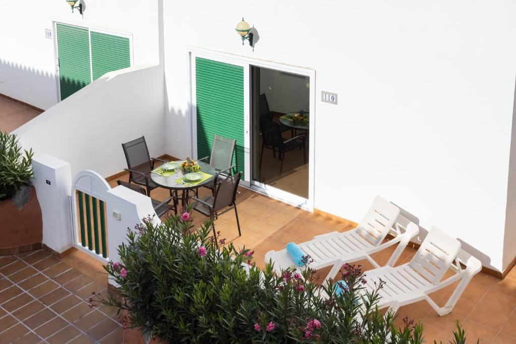 Balkón nebo terasa v ubytování Home2Book Cozy Apartment Costa del Silencio, Pool