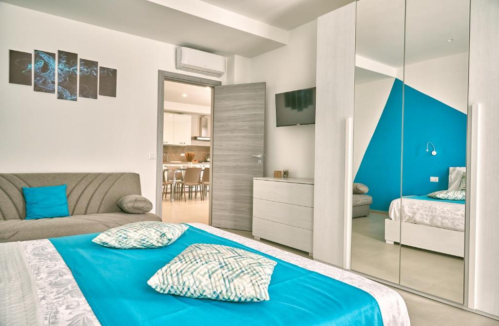 A bed or beds in a room at Il Casale di Monacella