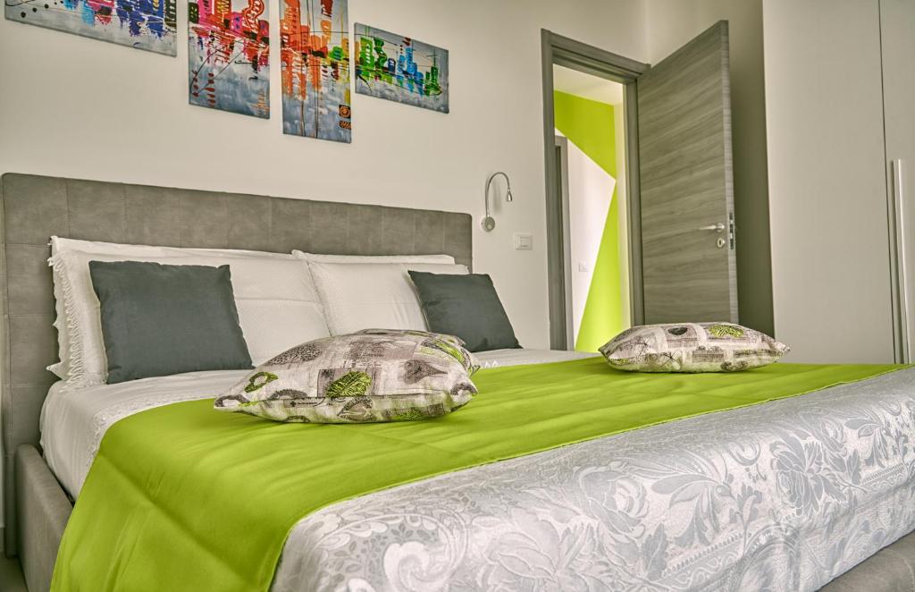 A bed or beds in a room at Il Casale di Monacella