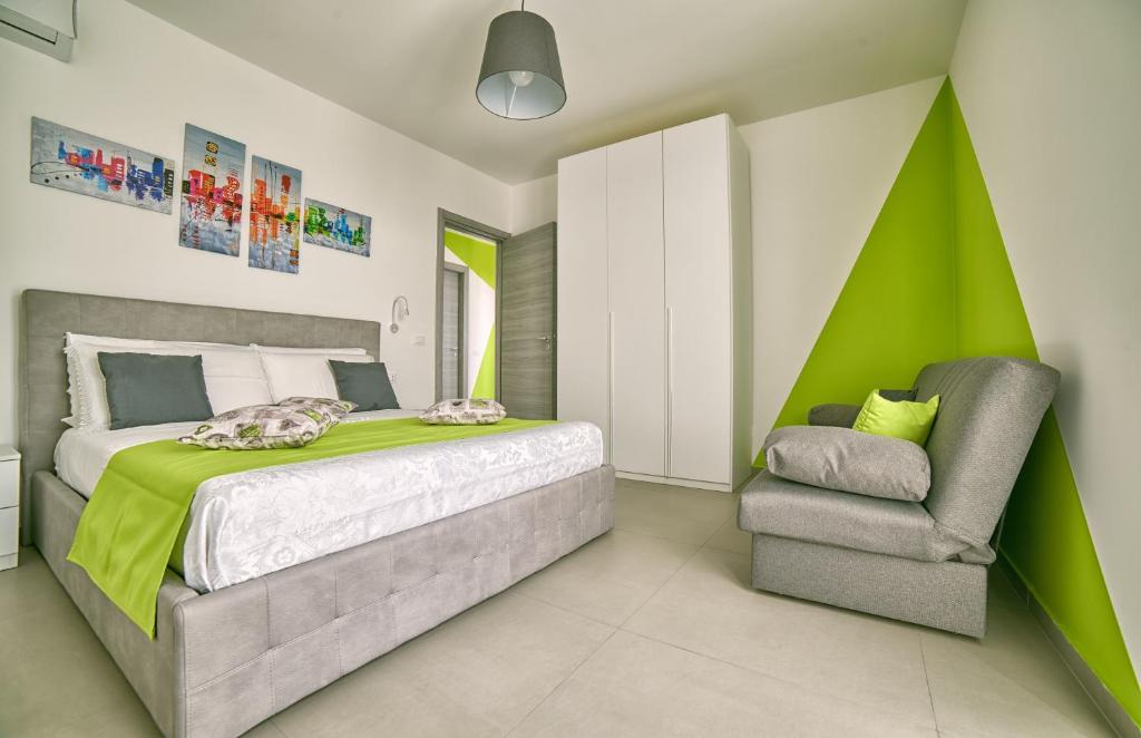 A bed or beds in a room at Il Casale di Monacella