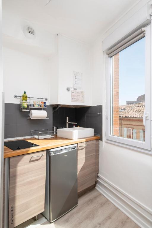 A cozinha ou kitchenette de City Rosa