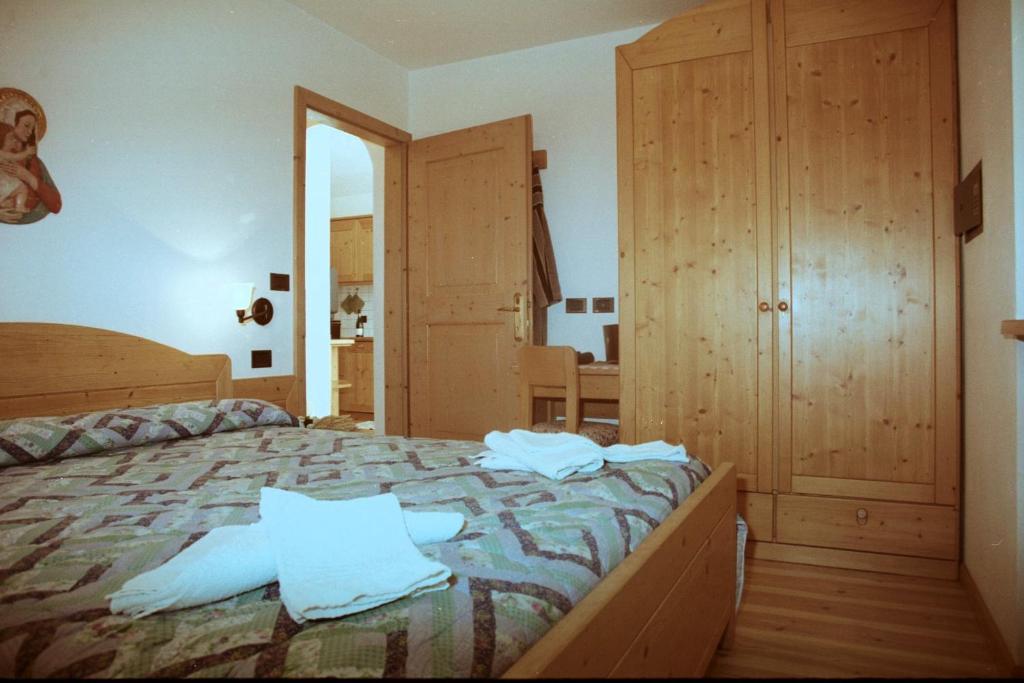 Postel nebo postele na pokoji v ubytování Residence Holiday