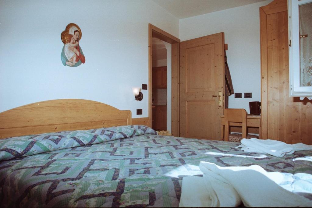 Postel nebo postele na pokoji v ubytování Residence Holiday
