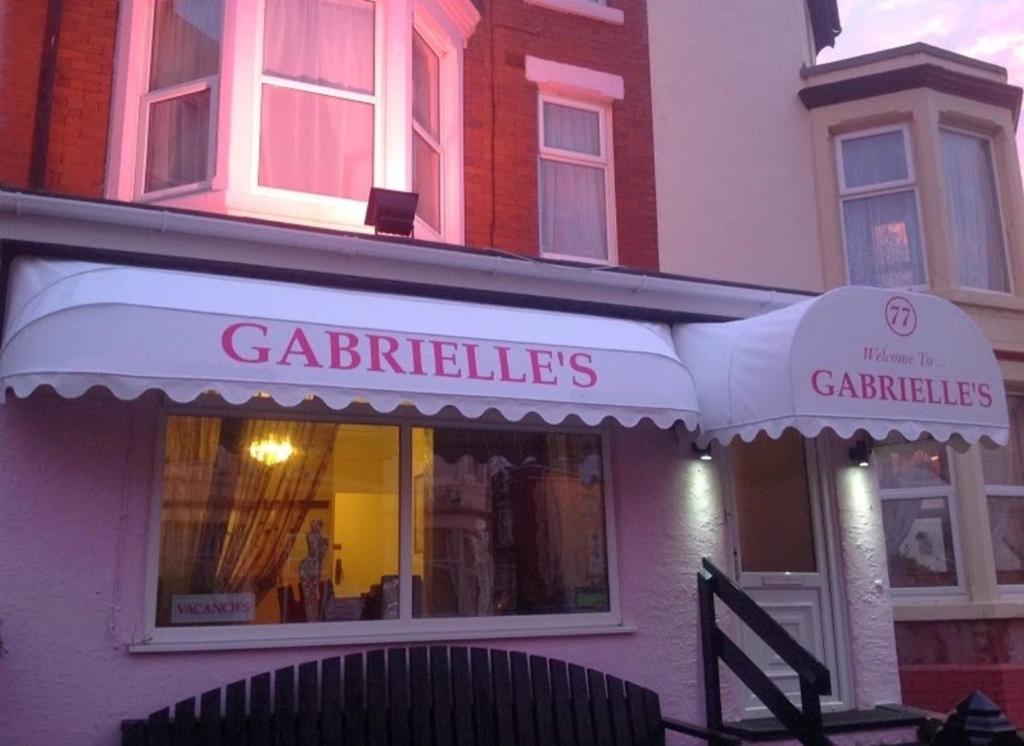 a store with a white awning on a building at Gabrielles in Blackpool