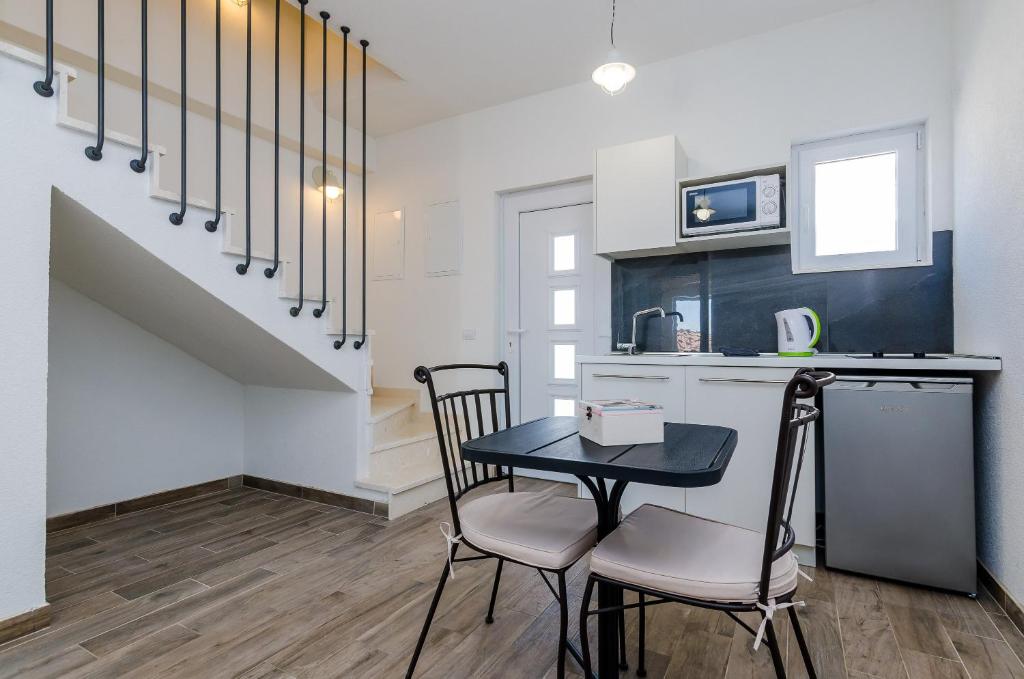 Kuchyň nebo kuchyňský kout v ubytování Apartments Life