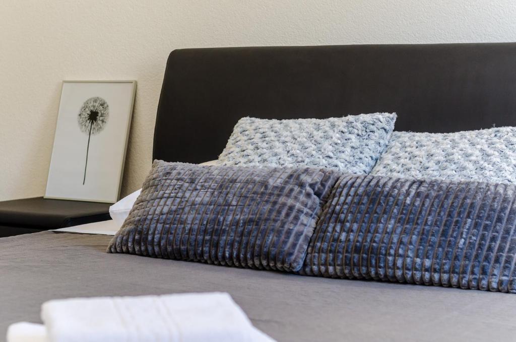 Postel nebo postele na pokoji v ubytování Apartments Life