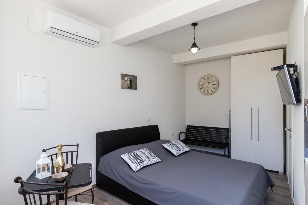 Postel nebo postele na pokoji v ubytování Apartments Life