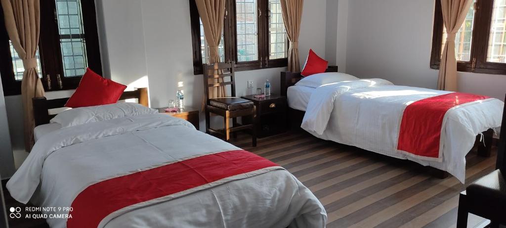 Llit o llits en una habitació de Hotel Bhagya