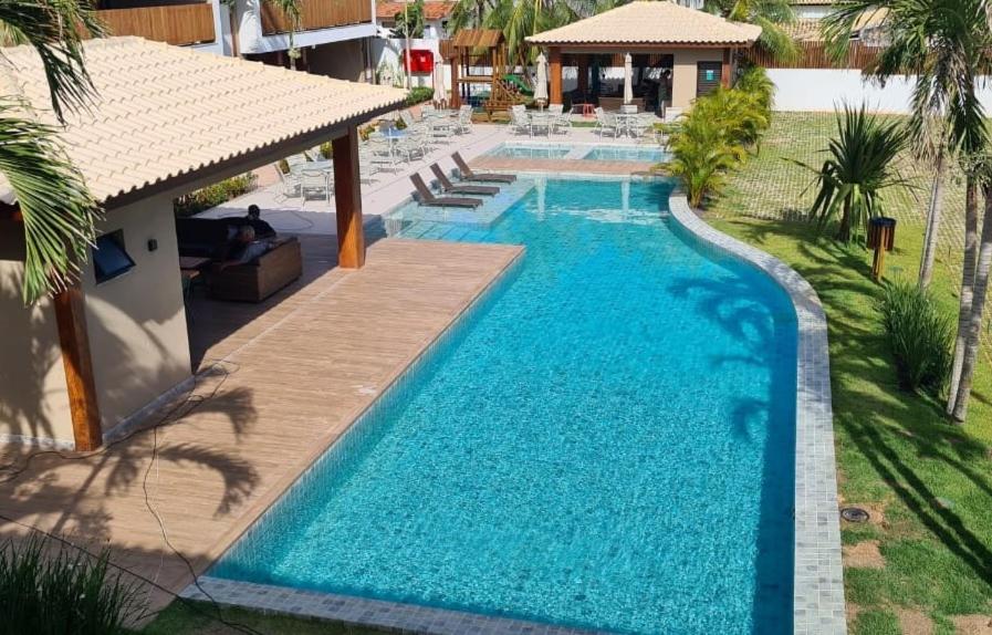 Bazén v ubytování Itacimirim Village Praia da Espera nebo v jeho okolí