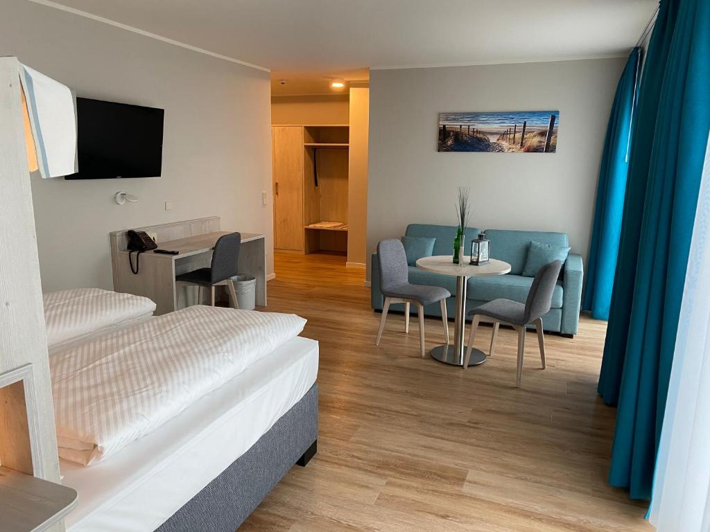 TV a/nebo společenská místnost v ubytování BeachSide
