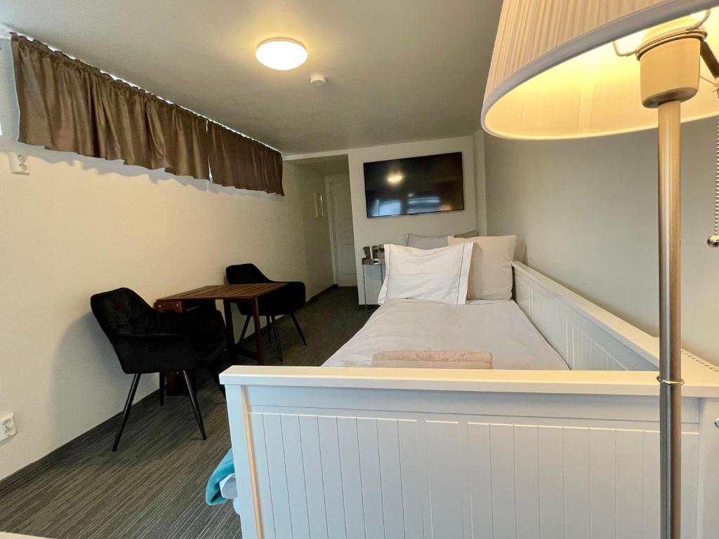 Postel nebo postele na pokoji v ubytování Vid Gekås Ullared Boende B&B