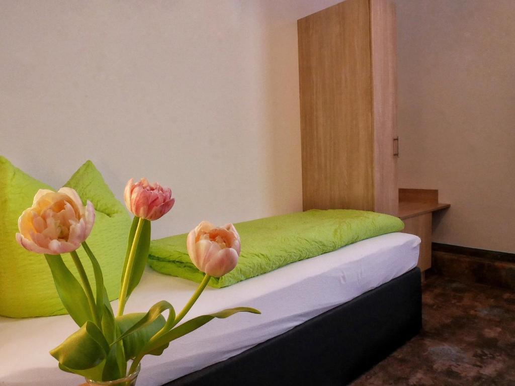 Postel nebo postele na pokoji v ubytování Wochner's Hotel-Sternen Am Schluchsee Hochschwarzwald