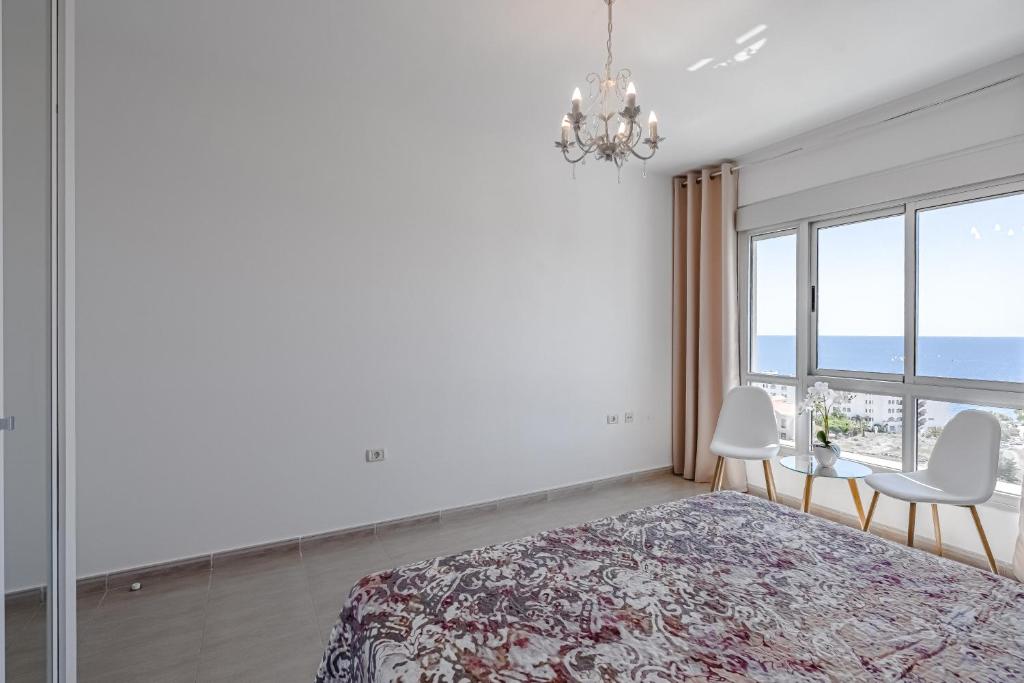 Postel nebo postele na pokoji v ubytování Pambnb - Sea Breeze Duplex Arenal