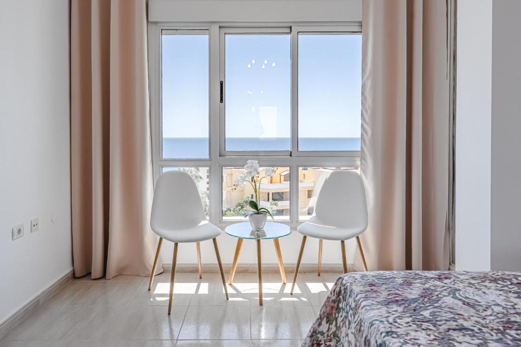 Postel nebo postele na pokoji v ubytování Pambnb - Sea Breeze Duplex Arenal