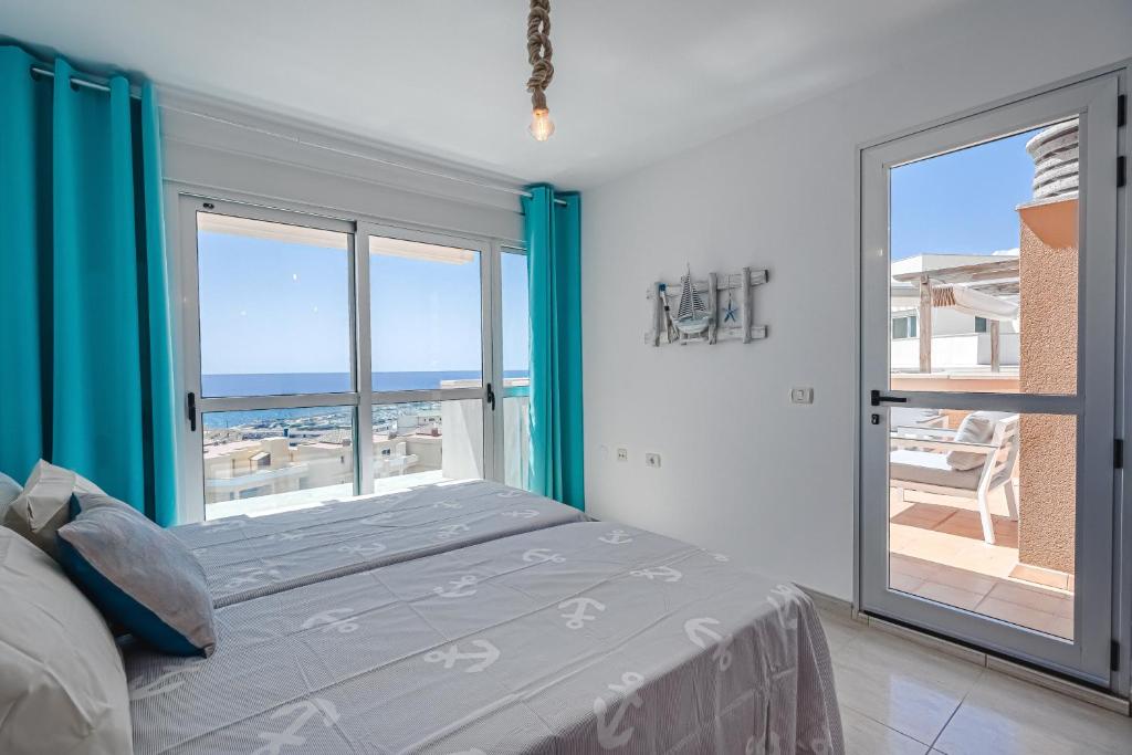 Postel nebo postele na pokoji v ubytování Pambnb - Sea Breeze Duplex Arenal