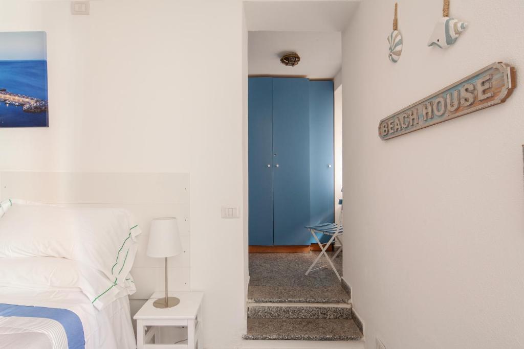 Postel nebo postele na pokoji v ubytování Ludovica Flat