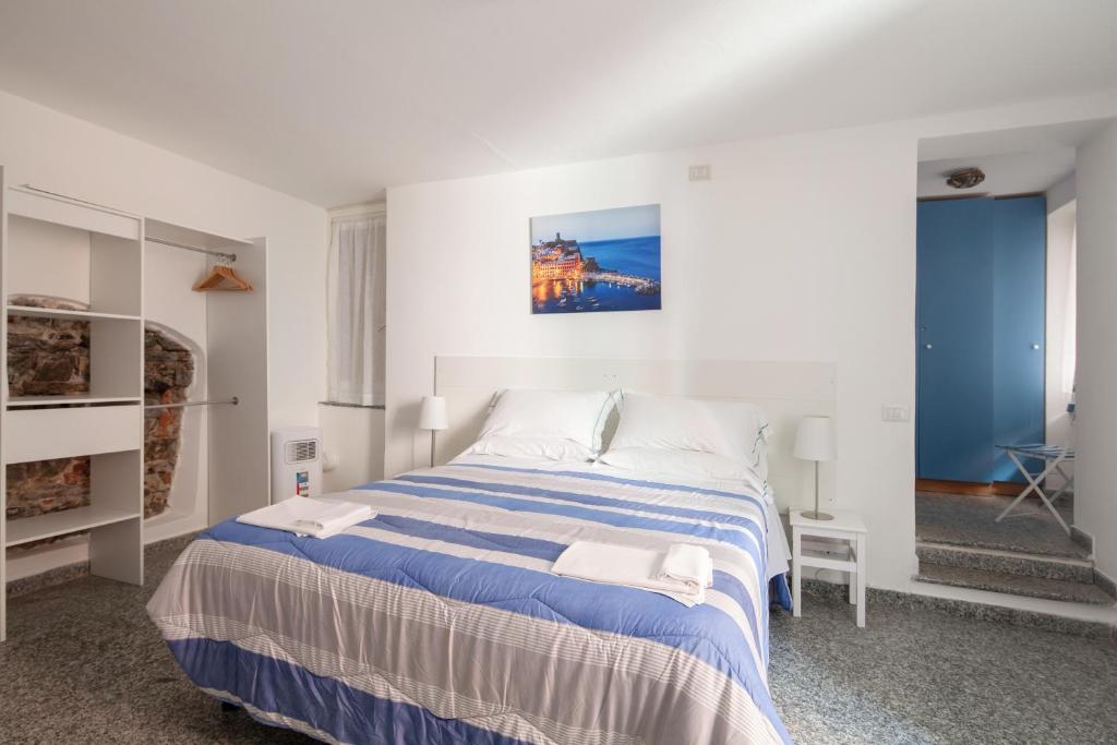 Postel nebo postele na pokoji v ubytování Ludovica Flat