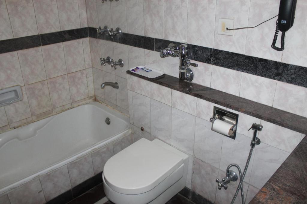 Koupelna v ubytování Hotel Sunstar Residency