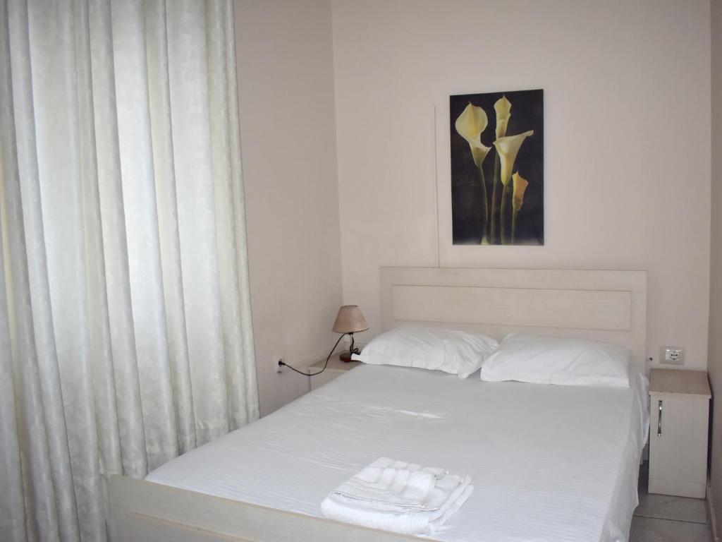Postel nebo postele na pokoji v ubytování Hotel Central