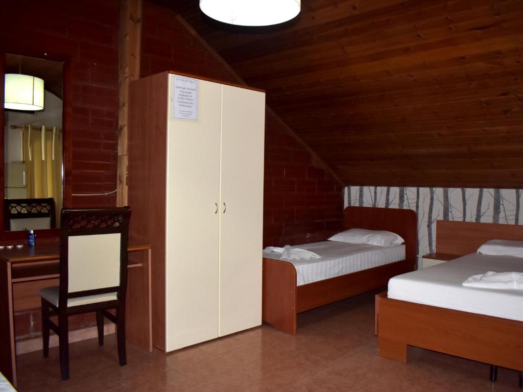 Postel nebo postele na pokoji v ubytování Hotel Central