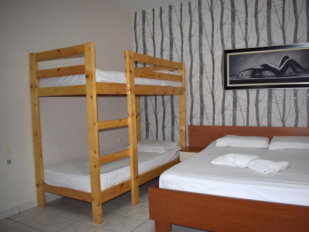 Postel nebo postele na pokoji v ubytování Hotel Central
