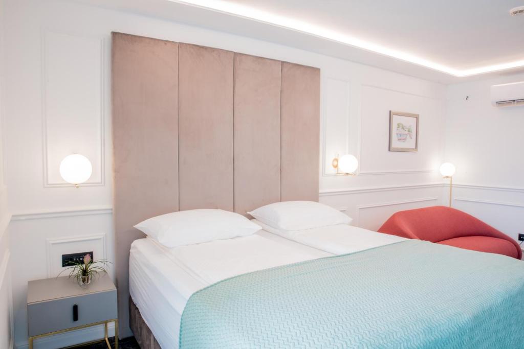 Postel nebo postele na pokoji v ubytování Hotel Krilo