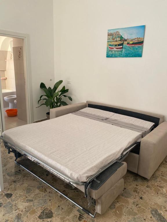 A bed or beds in a room at 6 Civico d arte Gargano home