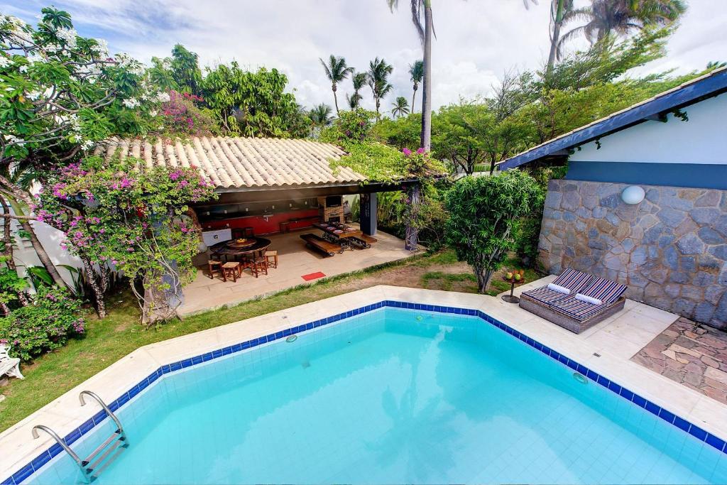  Casa Jardim na praia do Cumbuco com piscina por Carpediem