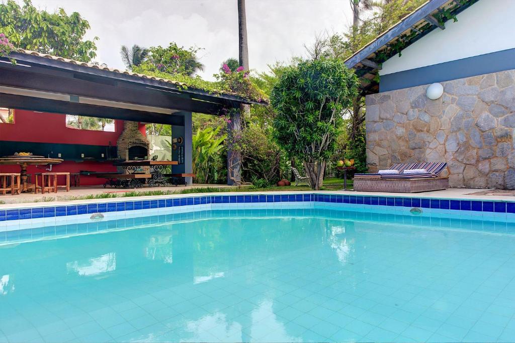  Casa Jardim na praia do Cumbuco com piscina por Carpediem