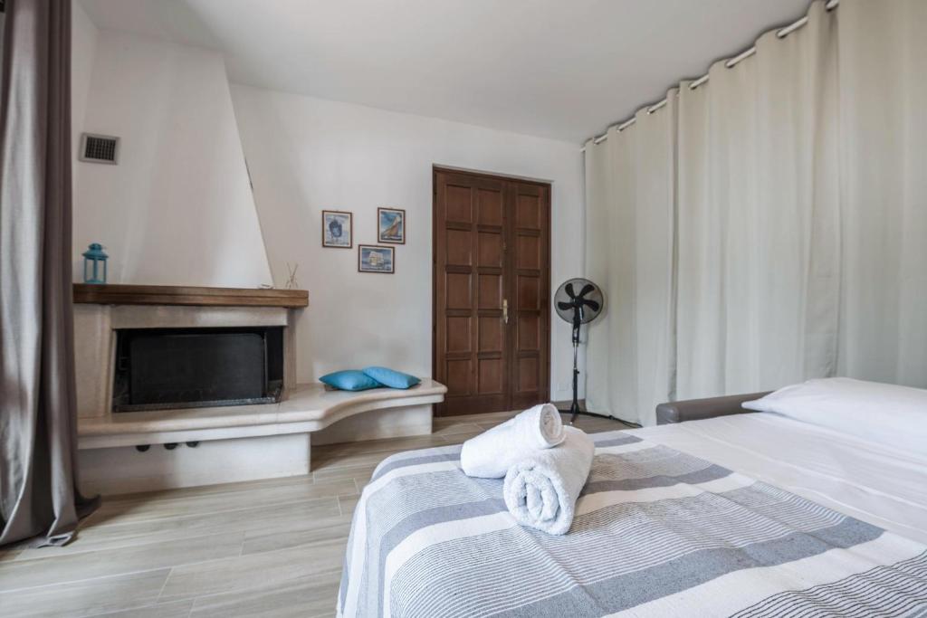 A bed or beds in a room at Appartamento Fiocco