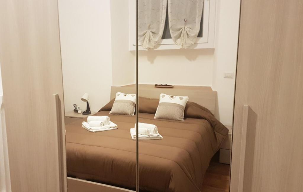 Łóżko lub łóżka w pokoju w obiekcie Trastevere Sweet Home