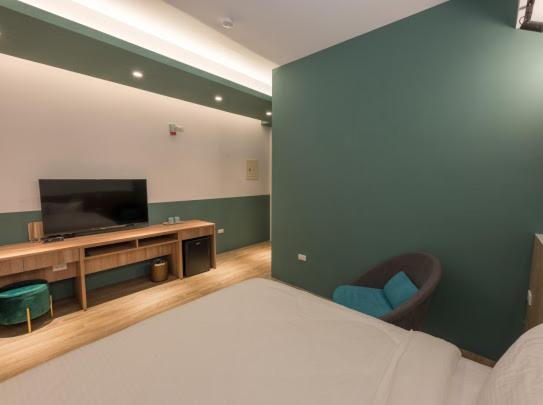 TV a/nebo společenská místnost v ubytování Yujing B&B 2