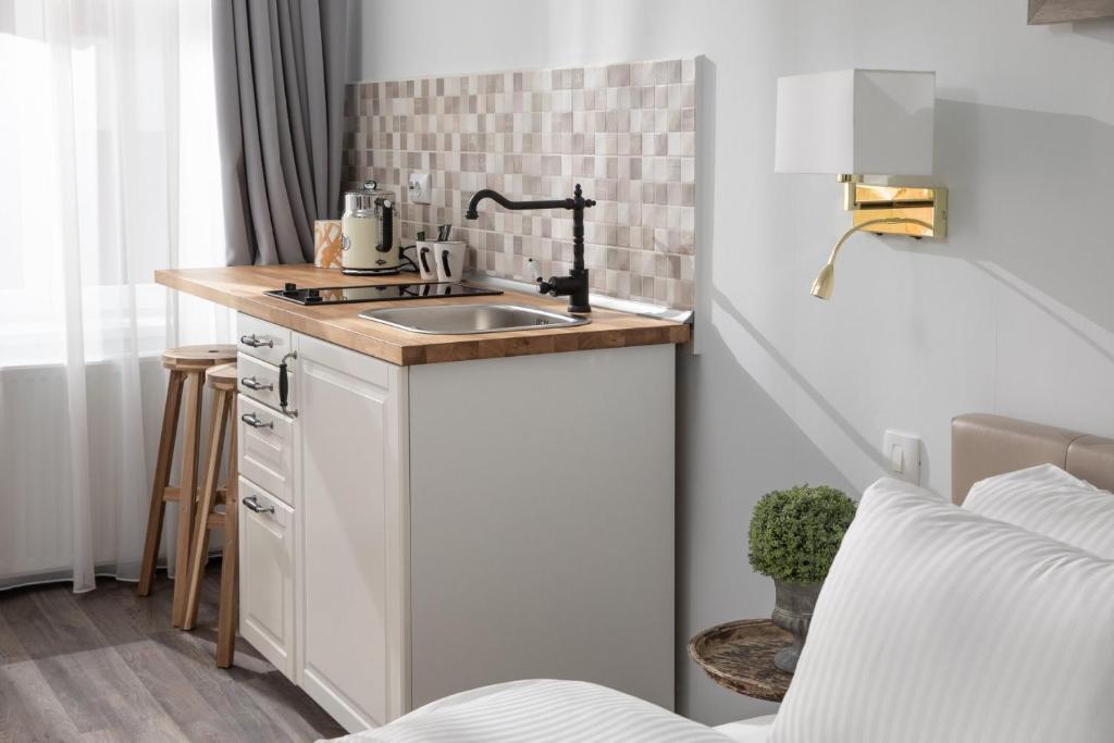 ALBERT RESIDENCE Historical City Center Aparthotel Book 3 nights and stay one for free in November