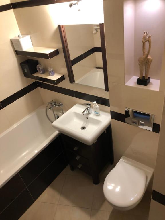 Kúpeľňa v ubytovaní Apartament Tuwima