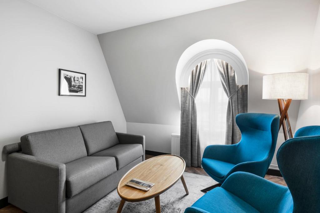 Posezení v ubytování MERCURE HOTEL KLAIPEDA CITY, Conference, Restaurant & Bar - Accor Group