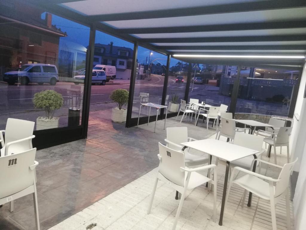 Reštaurácia alebo iné gastronomické zariadenie v ubytovaní Hotel El Millón