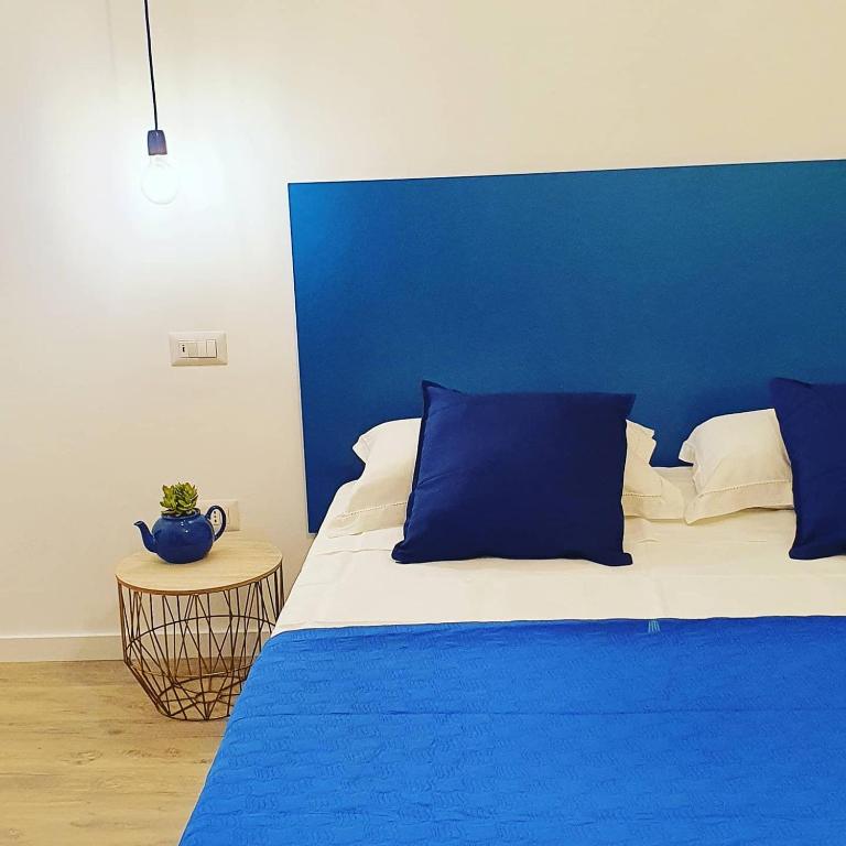 A bed or beds in a room at Maison Ligea