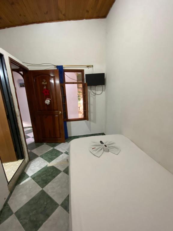 TV a/nebo společenská místnost v ubytování Hotel Policarpa