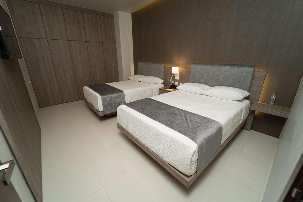 Postel nebo postele na pokoji v ubytování Sara N Hotel & Spa