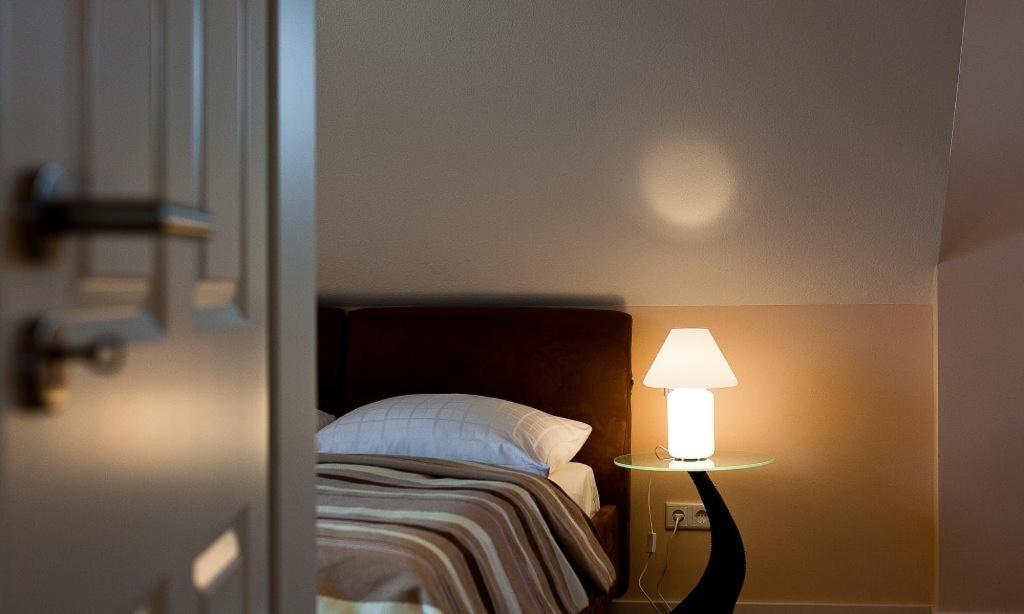 Postel nebo postele na pokoji v ubytování Boddensegler