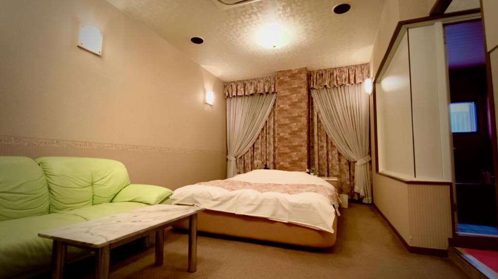 Postel nebo postele na pokoji v ubytování Hotel Sagano (Adult only)