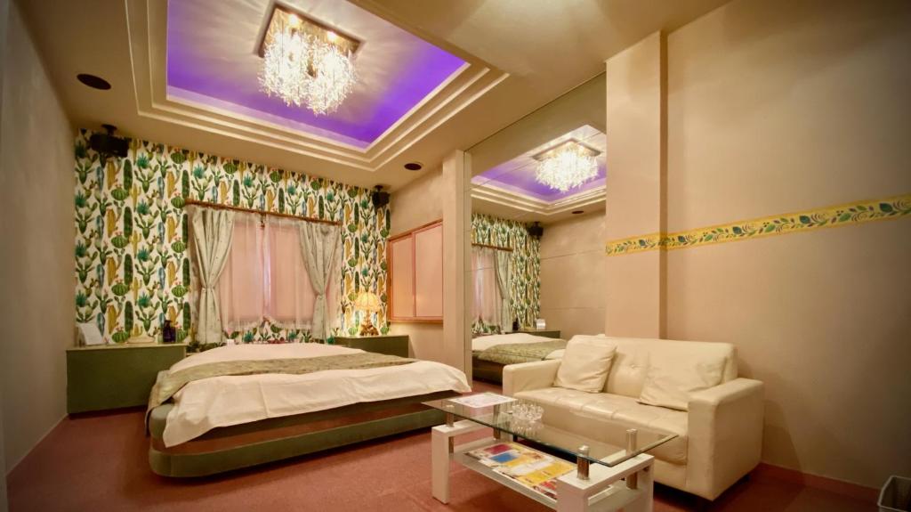 Postel nebo postele na pokoji v ubytování Hotel Sagano (Adult only)